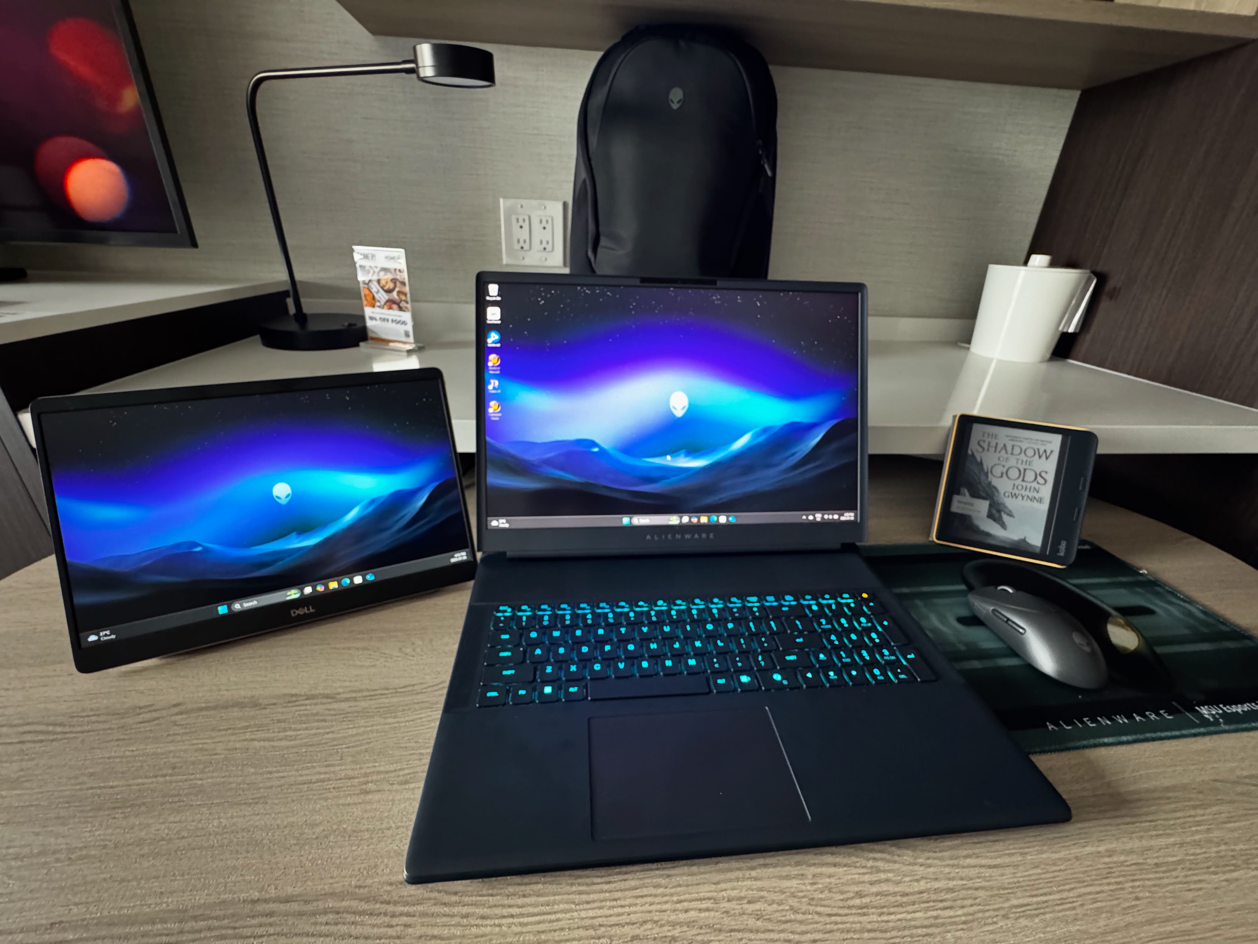 A Dell P1425 USB Monitor, an Alienware 18 Area-51, an Alienware 